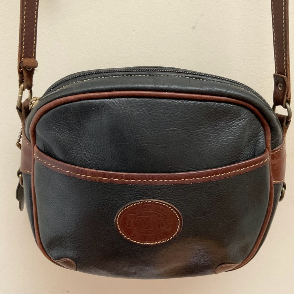 Roots black leather crossbody bag